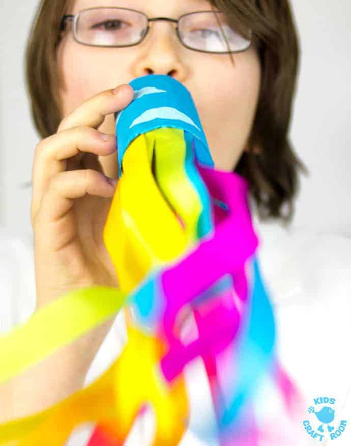 CARDBOARD TUBE RAINBOW BLOWERS are a colourful and fun kids craft! Kids love blowing this rainbow craft to see the streamers swoosh. A super TP roll St Patrick's Day craft or for a weather topic too.