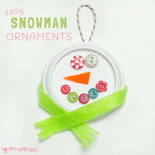 BUTTON SNOWMAN ORNAMENTS - Button eyes and snug scarves make these the cutest snowman craft for kids to make this Winter. A thrifty recycled Christmas and Winter craft for kids. #snowman #snowmancrafts #buttoncrafts #kidscrafts #ornaments #christmas #christmascrafts #winter #wintercrafts #recycledcrafts #wintercraftsforkids #craftideasforkids #kidscraftroom