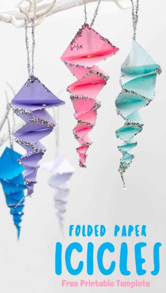 This Folded Paper Icicle Craft looks fantastic in white or colours. These homemade icicles are easy to make with the free printable pattern, just print, cut and fold! A lovely Winter craft for kids. #icicles #iciclecrafts #winter #wintercrafts #kidscrafts #papercrafts #origami #kidscraftroom #paperfolding