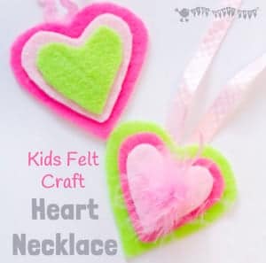 HEART NECKLACES are cute, colourful and no-sew! This kids felt craft is a great way for children to make homemade jewellery for themselves or as cute gifts. A lovely Mother's Day craft or Valentine's Day Craft for kids. #valentine #valentinesday #valentinescraft #valentinecraft #valentinescrafts #valentinecrafts #valentinesdayforkids #heart #love #heartcrafts #sewingforkids #homemadejewllery #necklace #DIYnecklace #feltcrafts #kidscrafts #craftsforkids #kidscraftroom #craftideasforkids