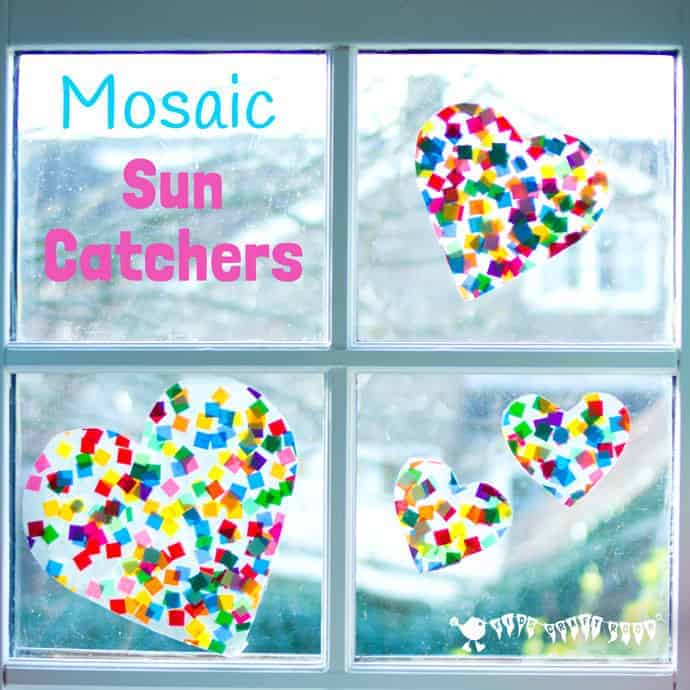 HEART SUNCATCHER MOSAICS for kids look gorgeous! Window art that's pretty, colourful and easily adaptable for kids of all ages. Fun for Valentine's Day, Mother's Day and Summer. #valentine #valentinesday #valentinesdaycraft #heartcrafts #mothersdaycrafts #kidscrafts #suncatcher #suncatchercrafts #kidsactivities #craftsforkids #summer #summercrafts #preschoolcrafts #craftideasforkids #valentinecraft #valentinescrafts #valentinecrafts #valentinesdayforkids #kidssummercrafts
