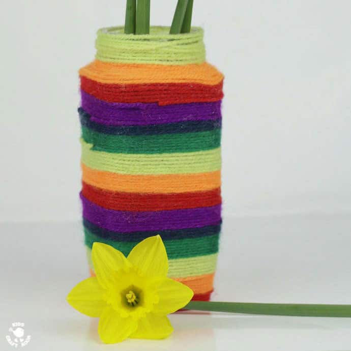 Make a wool wrapped vase. A colourful craft for kids.