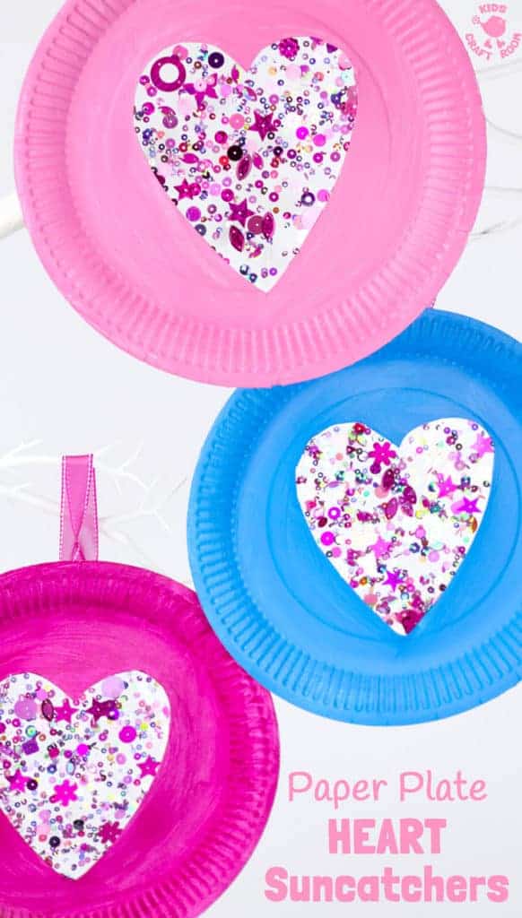 This PAPER PLATE HEART SUNCATCHER CRAFT is gorgeous! A simple heart craft perfect for Valentine's Day, Mother's Day and Summer. Great for all ages from toddlers to tweens. #valentine #valentinesday #valentinescraft #valentinecraft #valentinescrafts #valentinecrafts #valentinesdayforkids #heart #love #paperplate #paperplatecrafts #kidscrafts #heartcrafts #craftsforkids #kidscraftroom
