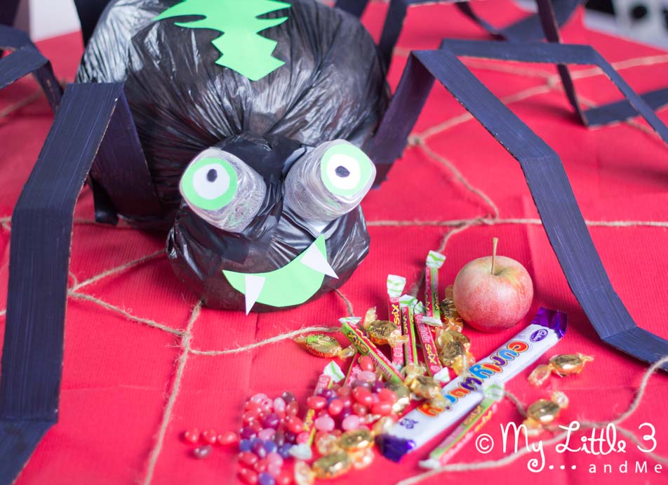 Make GIANT spider decoration for Halloween. A fun recycled craft for kids.