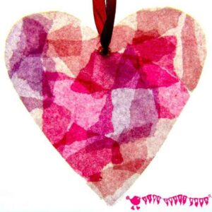 STAINED GLASS HEARTS Can you believe these pretty hearts are made from old milk jugs? A fabulous kids craft for Valentine's Day or Mother's Day.