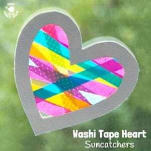 A heart craft with a WOW factor! This Washi Tape Heart Suncatcher craft is simple to make and looks amazing. A great Mother's Day or Valentine's Day craft for kids. #valentine #valentinesday #valentinescraft #valentinecraft #valentinescrafts #valentinecrafts #valentinesdayforkids #heart #love #heartcrafts #washitape #washitapecrafts #kidscrafts #kidscraftideas #craftsforkids #kidscraftroom #suncatchers #suncatchercrafts #windowcling #valentinesdaycraft #mothersday #mothersdaycraft